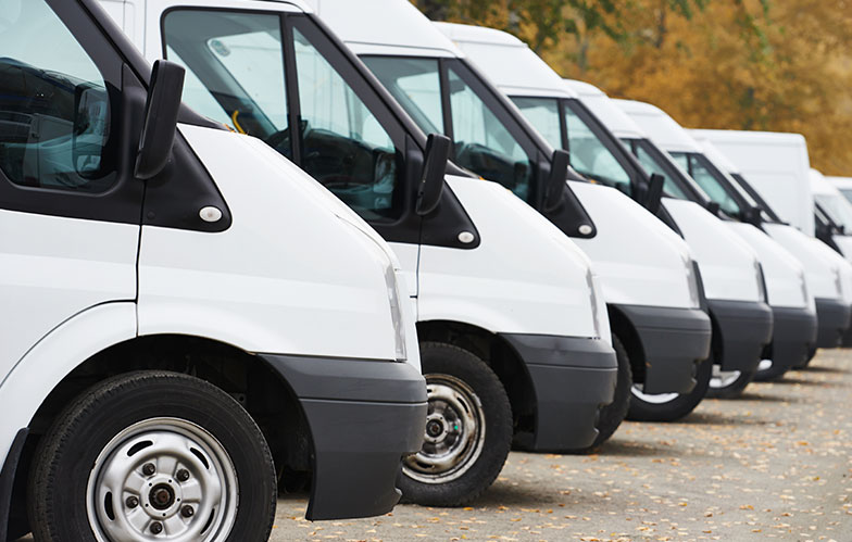 Fleet of technician vans lined up in our parking lot in Nassau County, Long Island