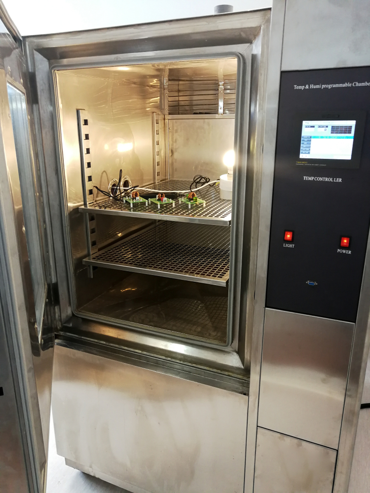 Testing equipment inside environmental chamber in laboratory