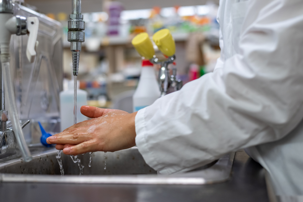 Washing hand after finishing work in biomedical research experimental teaching laboratory